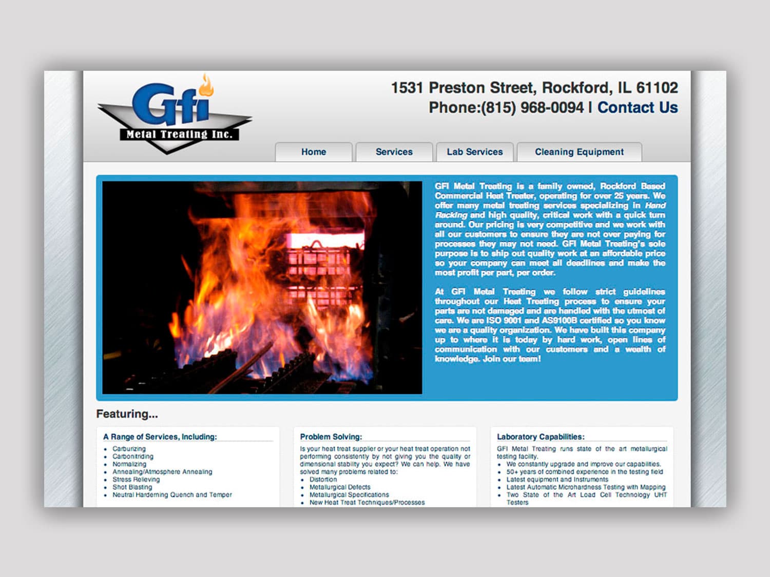 A screenshot of a website for an industrial heat-treating company that has a metallic, grey design motif with an image of an industrial furnace billowing flames out on racks of metal objects